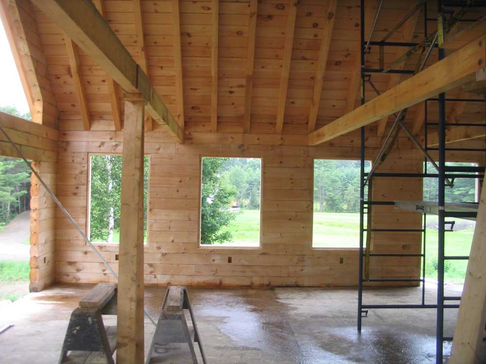 building a log home in maine